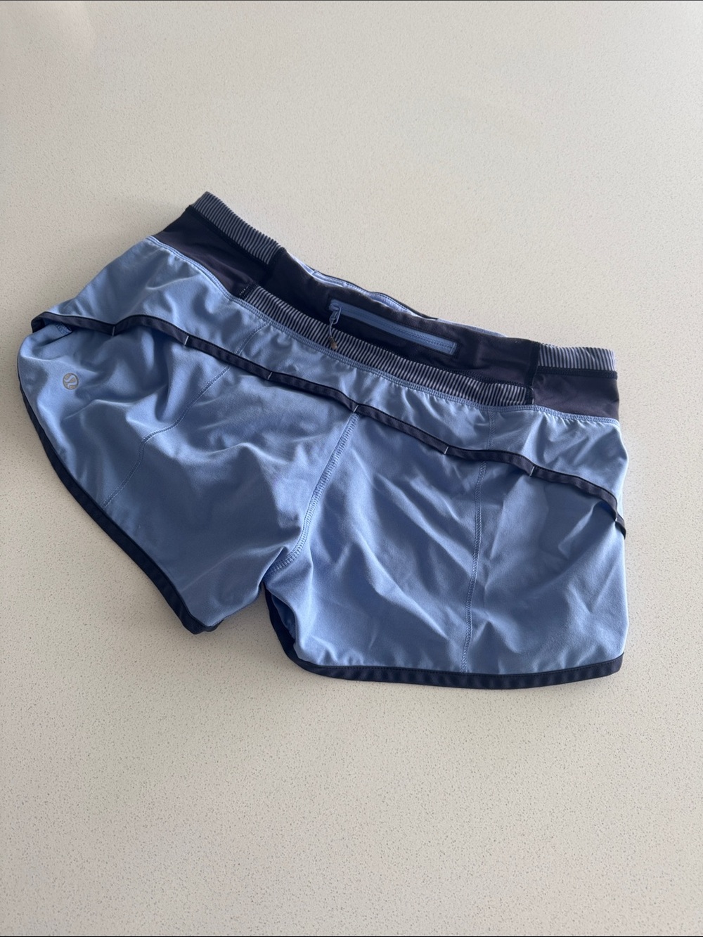 lululemon athletica light blue athletic shorts with navy trim